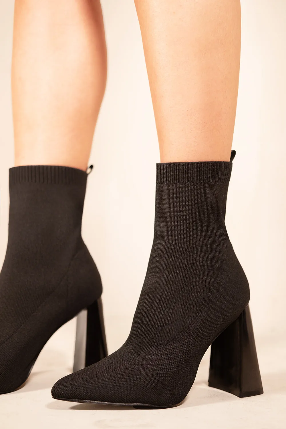 FLUERETTA KNITTED BLOCK HEEL ANKLE BOOTS WITH POINTED TOE IN BLACK