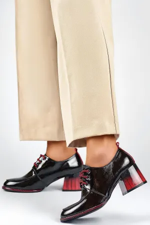 Heeled eco leather low shoes