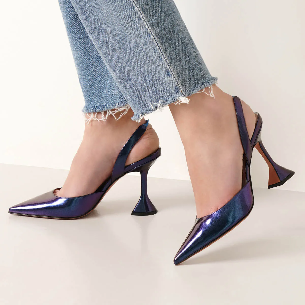 Holli sling patent metallic pumps